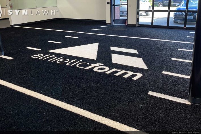 SYNLawn Shreveport LA Prefab turf logos for athletic weight room applications